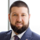 Professional headshot of attorney Logan Murray